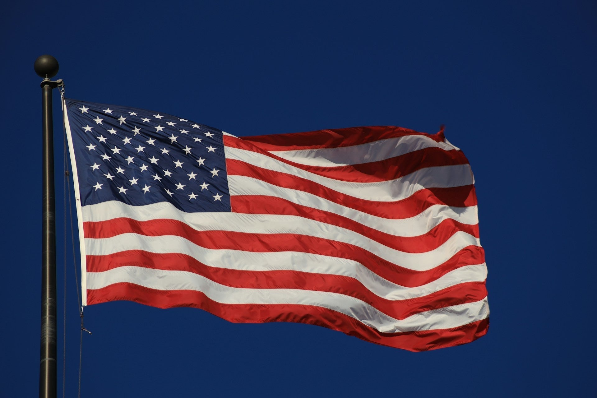 Landscaping Tips to Highlight Your Home Flagpole – Stand Flag Poles